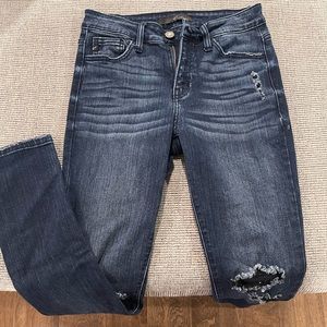 Dark wash kancan jeans with distressed knees